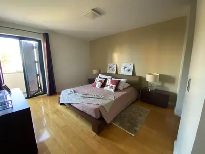a bedroom with a bed with two pillows on it at Seaview Nice&Easy - Free parking in Funchal