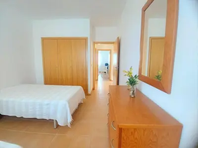 a small kitchen with a sink and a mixer at Desertrose in Porto Santo