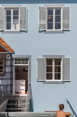 two different views of a window on a building at Villa Quebra Costas by An Island Apart in Funchal