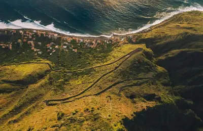 an aerial view of a mountain with the ocean at Tides proprety - Medium Tide in Paul do Mar