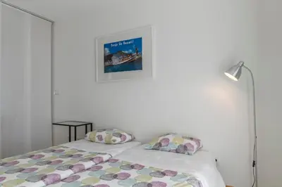 a bedroom with a bed and a picture on the wall at Atlantic Sagres in Sagres