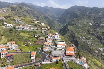 an aerial view of a village on a mountain at Villa Sol da Candelária by GALMI in Ribeira Brava