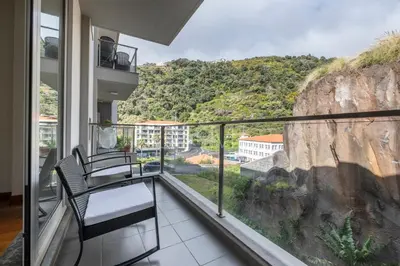 a balcony with a view of a mountain at Wings Apartment CE by GALMI in Santa Cruz