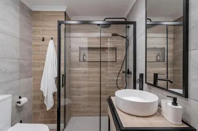 a bathroom with a sink and a shower at Casa Branca VI by An Island Apart in Funchal