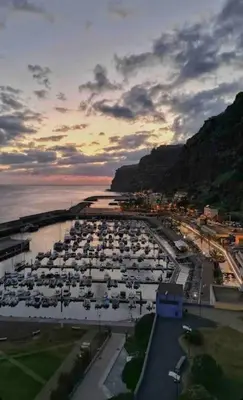 a view of a marina with a bunch of boats at Seaside & Mountain Views & Cozy Calheta Retreat MQ1 in Calheta