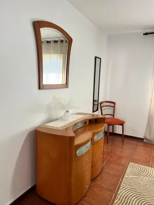 a bathroom with a vanity with a mirror on the wall at Seaside & Mountain Views & Cozy Calheta Retreat MQ1 in Calheta
