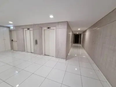 an empty hallway with two doors in a building at Funchal Centrum - La Vie Apartment with Parking! in Funchal