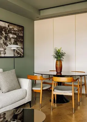 a living room with a table and a couch at The Reserve - within Savoy Palace - The Leading Hotels of the World in Funchal
