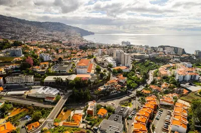 an aerial view of a city with the ocean at Island Feeling in Funchal