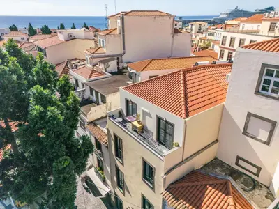 an aerial view of a city with buildings at Tanoeiros Residence by An Island Apart in Funchal