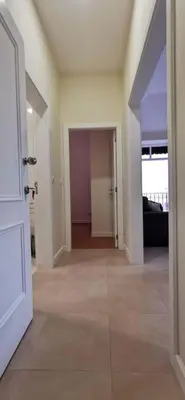 an empty living room with a door open to a hallway at Franciscus 1a in Funchal