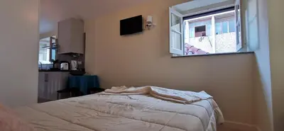 a bedroom with a bed and a window at Franciscus 2c in Funchal