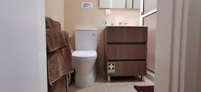 a small bathroom with a toilet and a sink at Franciscus 2c in Funchal