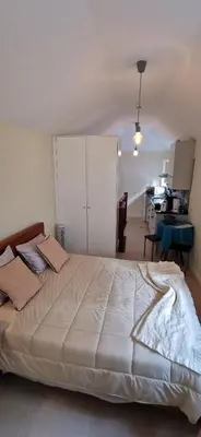 a bedroom with a large white bed in a room at Franciscus 2c in Funchal