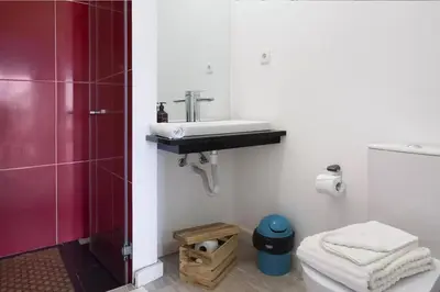a bathroom with a sink and a toilet at Arrifes View 2 Funchal by Rentallido in Funchal