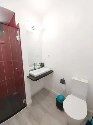 a bathroom with a toilet and a sink at Arrifes View 2 Funchal by Rentallido in Funchal