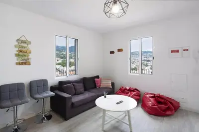 a living room with a couch and two chairs at Arrifes View 2 Funchal by Rentallido in Funchal