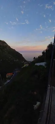 a view of the ocean from a hill at Levadinha - Nature guest house in Madalena do Mar