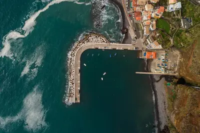 an aerial view of a beach and the ocean at Apt 'A Gaioa' in 'The Cliff Coast Accomodation' in Paul do Mar