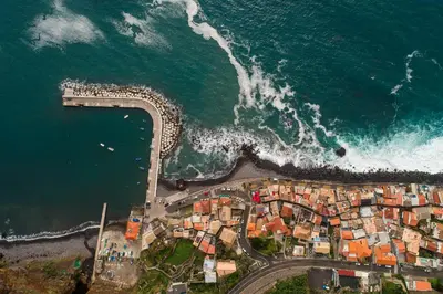 an aerial view of a town next to the ocean at Apt 'A Gaioa' in 'The Cliff Coast Accomodation' in Paul do Mar
