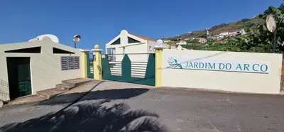 a building with a sign that reads karlimaru do arco at Sunny Arco Retreat in Arco da Calheta