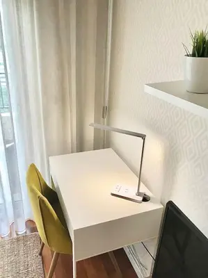 a white desk with a laptop on top of it at Gemini Apartment by AM in Funchal