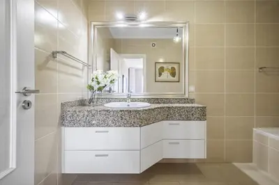 a bathroom with a sink and a mirror at Hideaway Apartment by Homie in Caniço