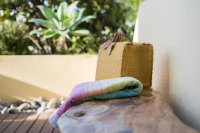 a bottle with a bag on top of a table at By the Atlantic Apartments 3-bedroom in Funchal