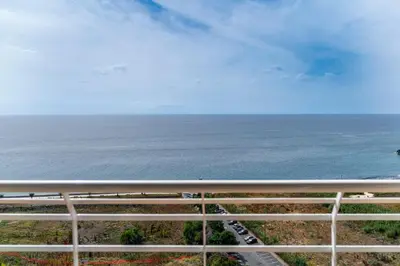 a view of the ocean from a balcony at Vista Formosa I by An Island Apart in Funchal