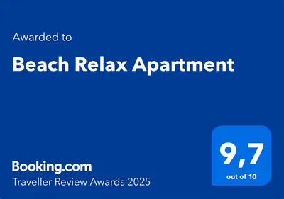 a blue sign with the words beach relax appointment at Beach Relax Apartment in Porto Santo