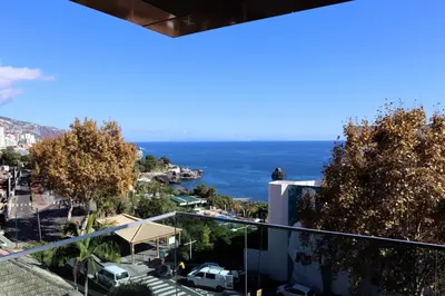 a view of the ocean from a building at Seaside XXI-10, By OP in Funchal