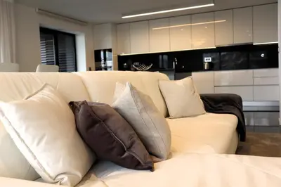 a white couch with pillows on top of it at Seaside XXI-10, By OP in Funchal