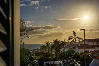 a view of the ocean from a balcony of a house at Pena Apartments - B by MTH in Funchal