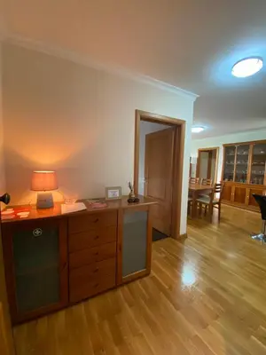 an empty room with a desk with a lamp on it at Apartamento Costa Do Sol V in Funchal