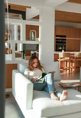 a bedroom with a white bed with two pillows at Villa Beatriz Ocean View in Aljezur