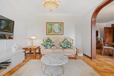 a living room with a couch and a table at Central Lido Apartment by Homie in Funchal