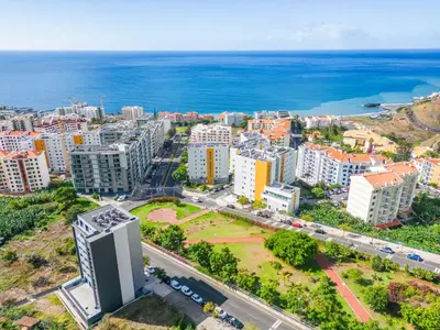 an aerial view of a city and the ocean at Tower Penthouse by Homie in Funchal