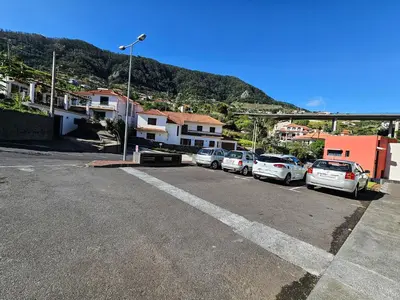 a group of cars parked in a parking lot at Machico Oasis - Mountainview in Machico