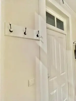 a white door with a window next to it at Quartos privados - Quinta da Paz in Santa Cruz