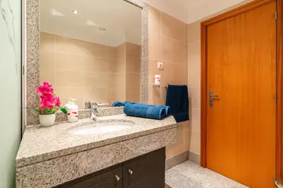 a bathroom with a sink and a mirror at Katerina´s Place - Funchal in Funchal