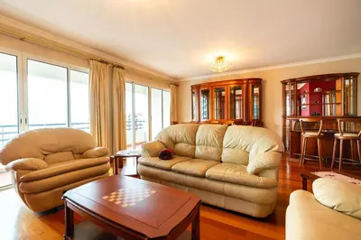 a living room with two couches and a coffee table at Katerina´s Place - Funchal in Funchal