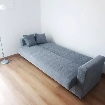 a bed in the corner of a room at Casa Bela Vista Studio 2 in Ribeira Brava