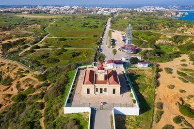 an aerial view of a building on a hill at Porto de Mos 86 by Destination Algarve in Lagos