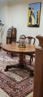 a wooden coffee table in a room with a rug at Theo's City House in Funchal