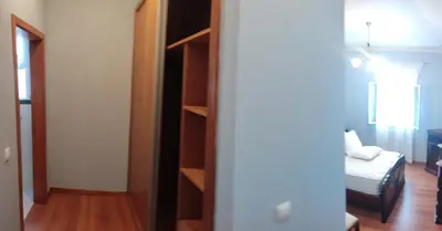 a room with a room with a bed and a closet at Brisas do Atlántico in Porto Moniz