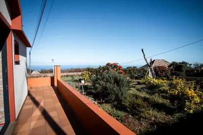 a view of a garden from a balcony of a house at Casa da Montanha in Salão