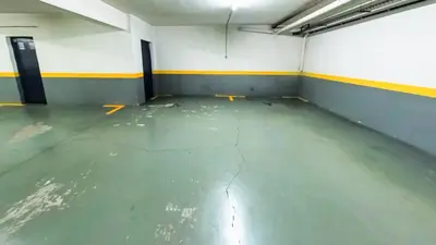 an empty parking garage with a cracked floor at LIDO CASA BRANCA in Funchal