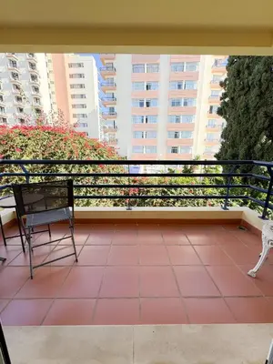 a balcony with a bench and some buildings at LIDO CASA BRANCA in Funchal