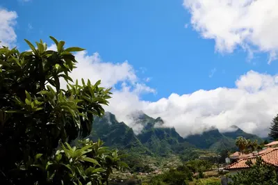 a view of the mountains with clouds in the sky at Mountain View Villa in São Vicente