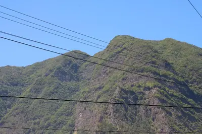 a mountain with power lines in front of it at Mountain View Villa in São Vicente